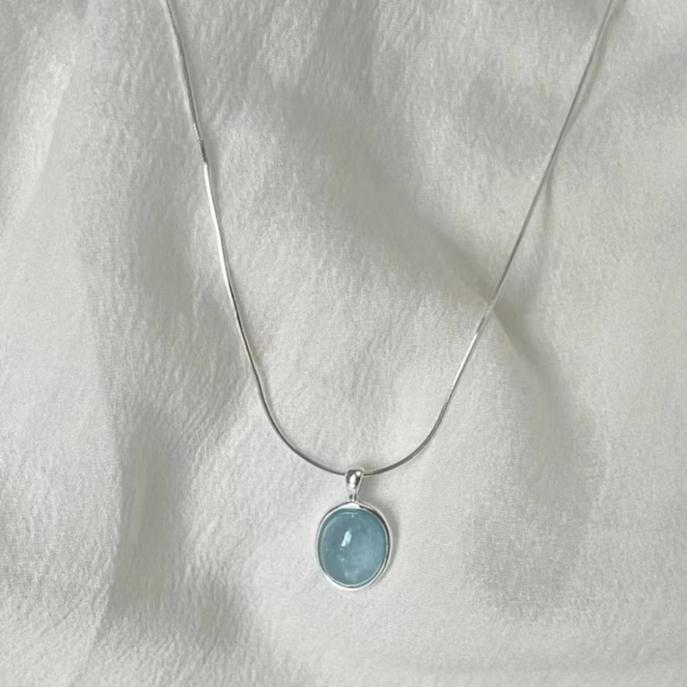 Oceanic Opulence: Silver Blue Glass Stone Necklace